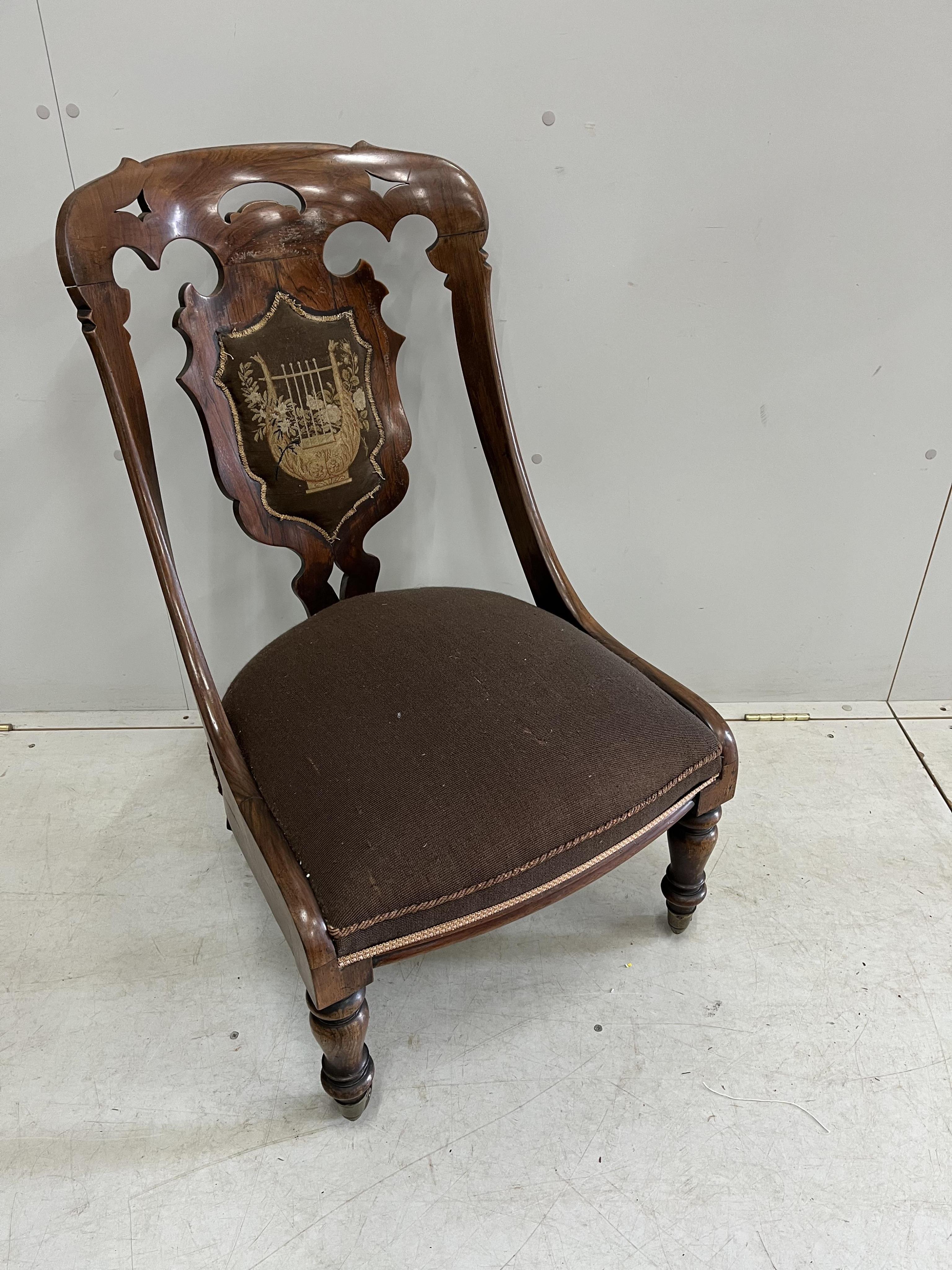 A Victorian rosewood side chair, width 52cm, height 87cm. Condition - fair
